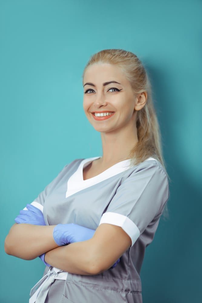 Female dentist in her 30s smiling